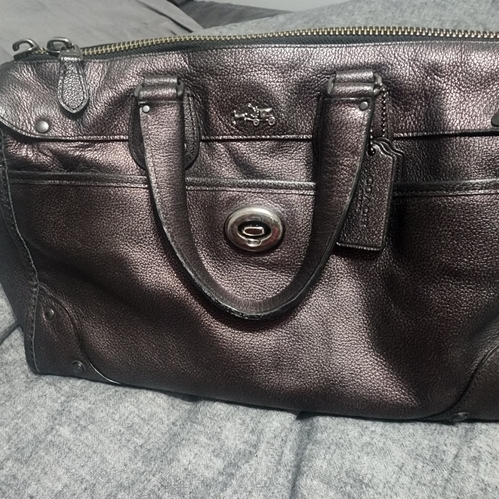 Limited hologram coach purse